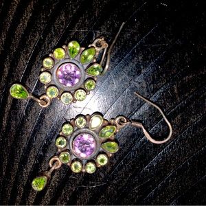 Silver earrings, purple and green gemstones.